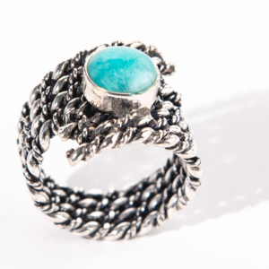 Handmade sterling silver ring with a woven band and amazonite stone.