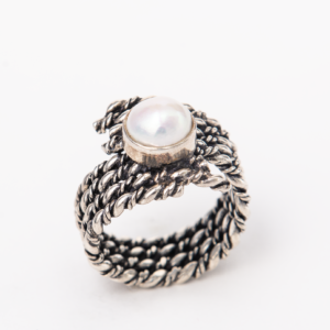 Handcrafted sterling silver ring with a twisted band pearl ring