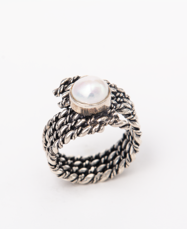 Handcrafted sterling silver ring with a twisted band pearl ring