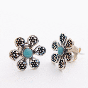Peruvian Delight .950 sterling silver Andean Bloom stud earrings — six-petal flower with hand-granulated petals and teal amazonite cabochon, oxidised finish